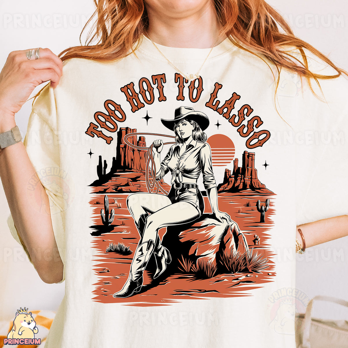 a woman wearing a white shirt with a cowboy on it