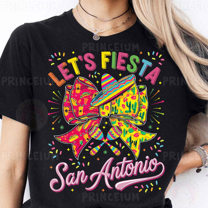 a woman wearing a black tshirt with a colorful bow