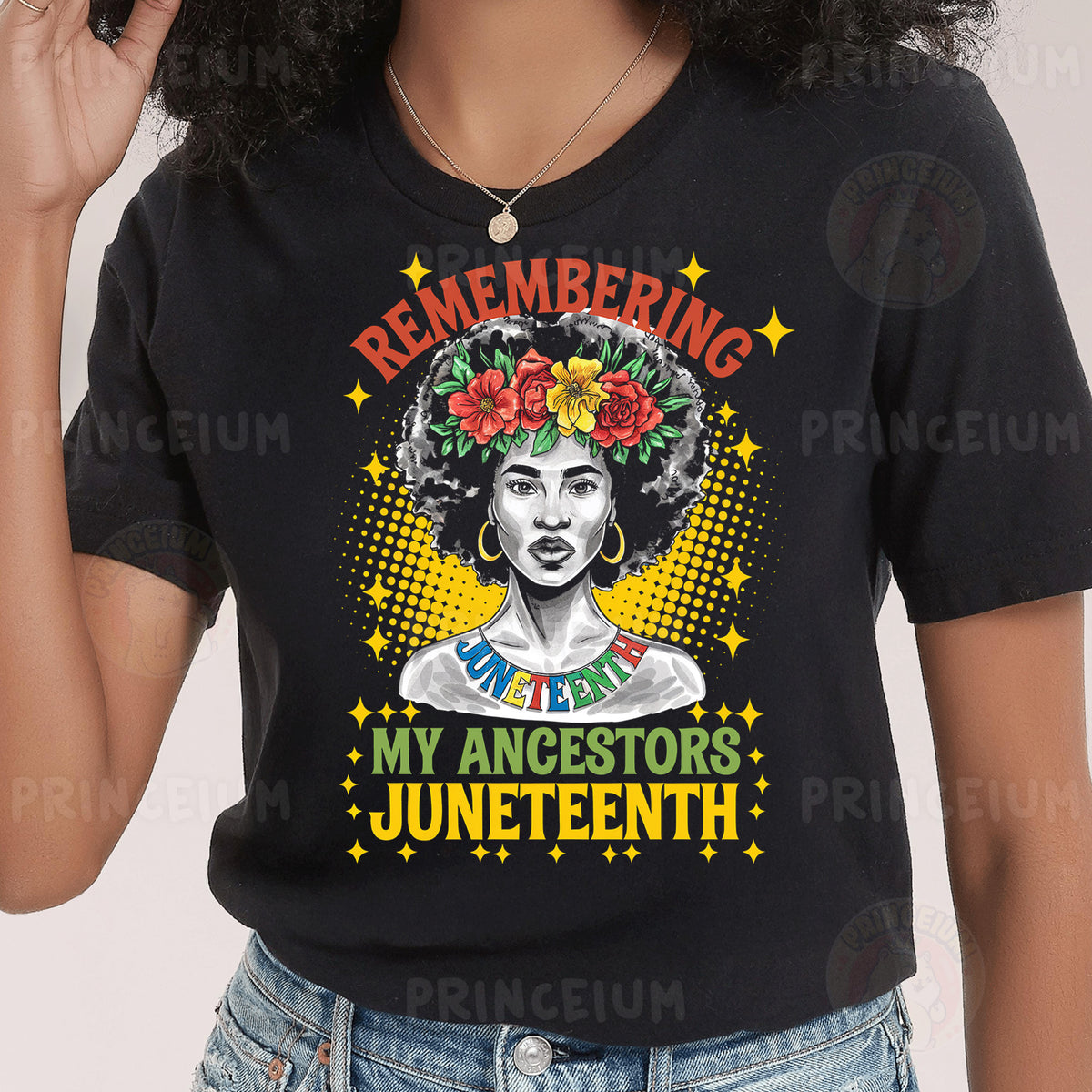 a woman wearing a black t - shirt with an image of a woman with flowers