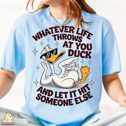 a woman wearing a blue shirt with a duck on it