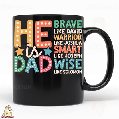 a black coffee mug with colorful lettering on it