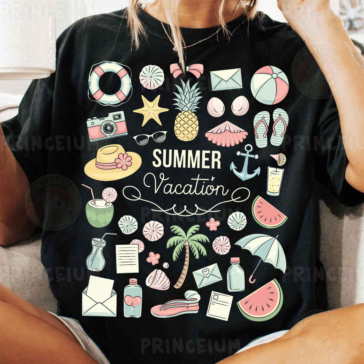 a woman sitting on a couch wearing a t - shirt that says summer vacation
