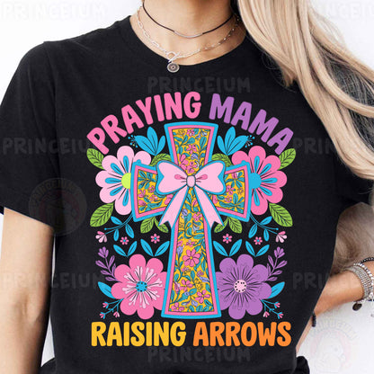 a woman wearing a t - shirt that says praying mama raising arrows