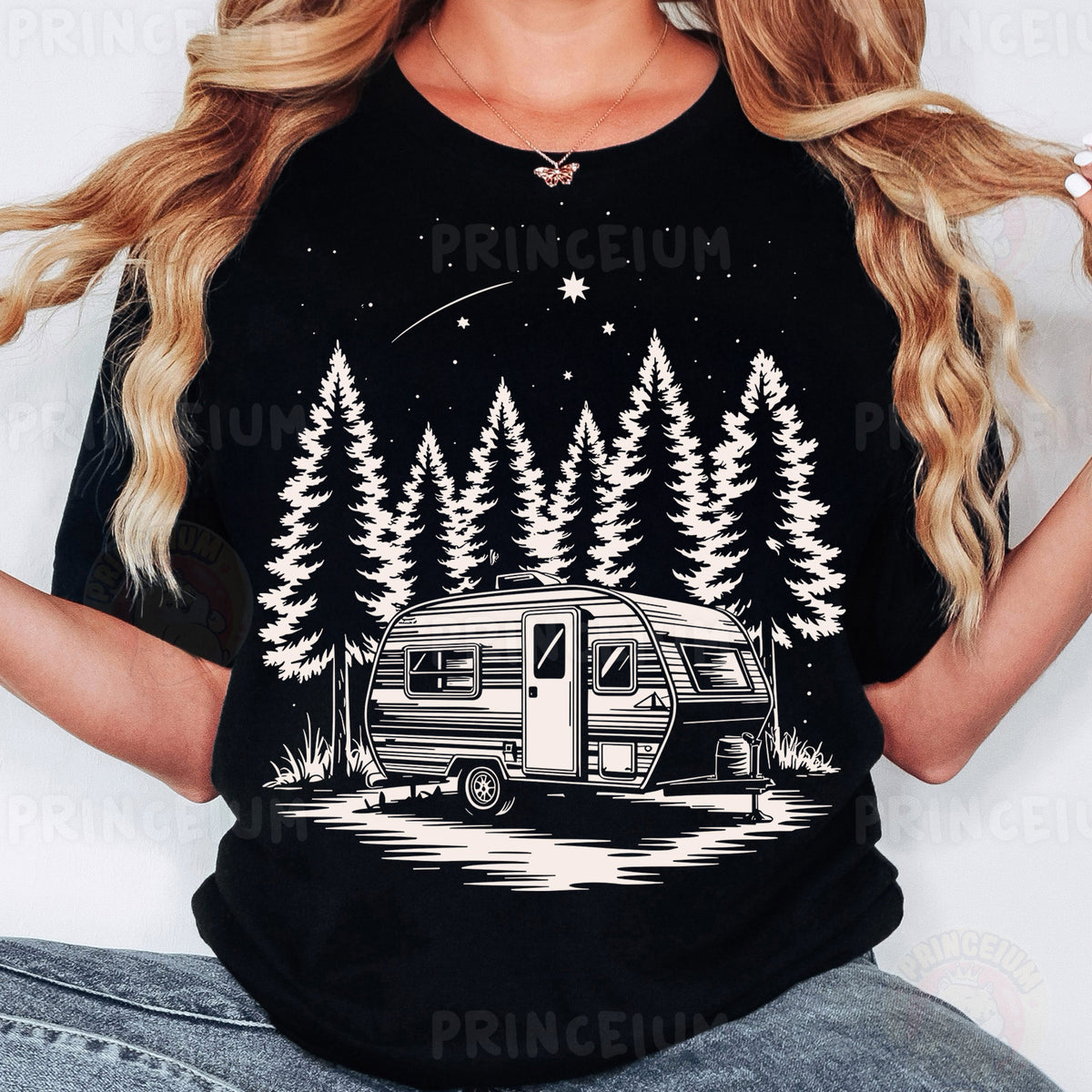 a woman wearing a black shirt with a camper on it