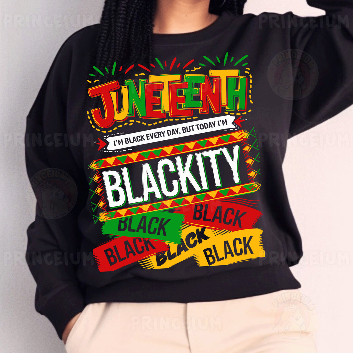 a woman wearing a black sweatshirt with the words black kitty on it