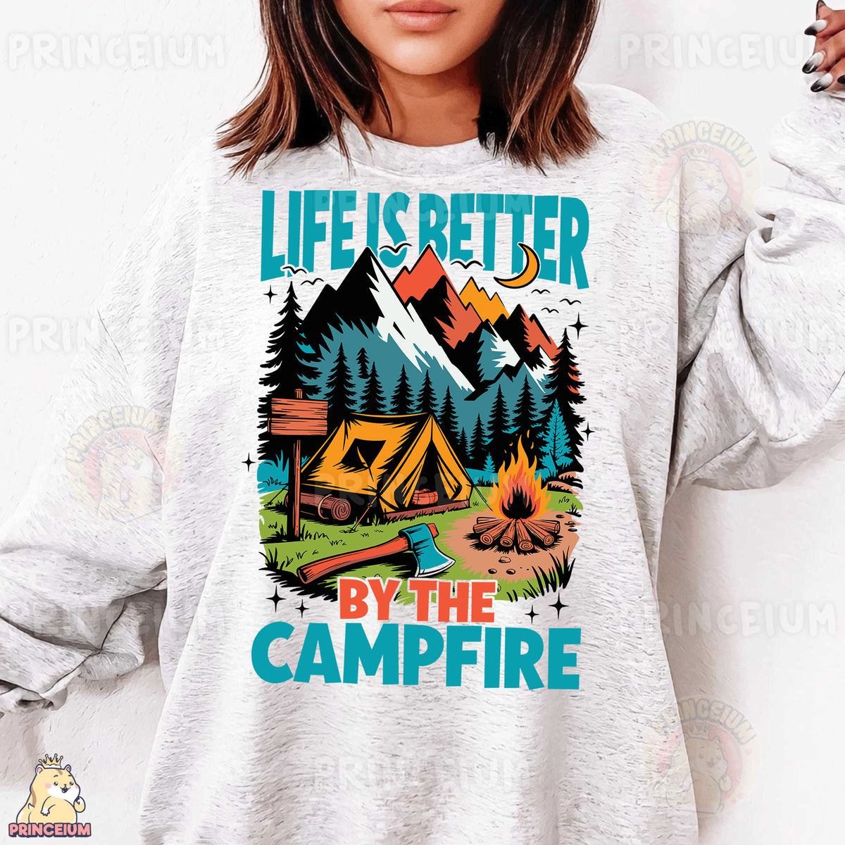 a woman wearing a sweatshirt that says life is better by the campfire