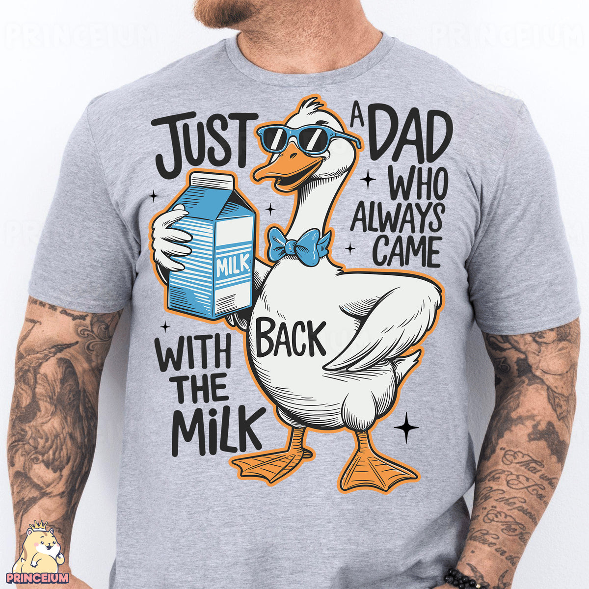 a man wearing a gray shirt with a duck holding a milk carton