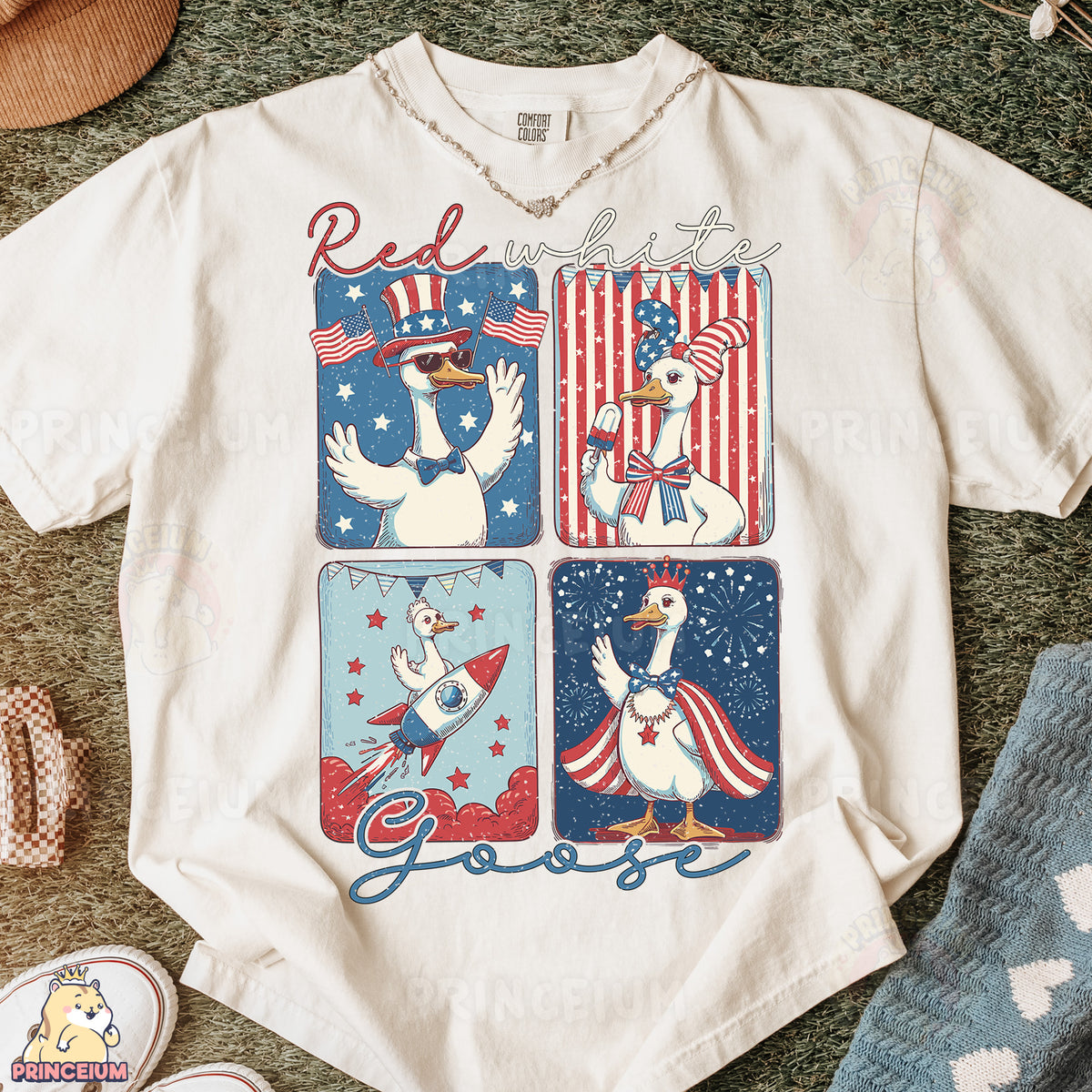 a white t - shirt with a picture of two geese on it