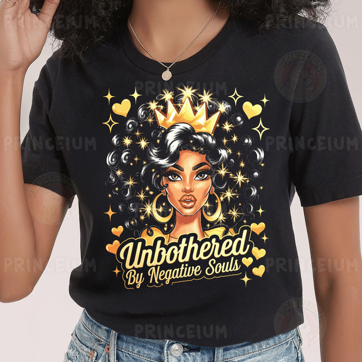a woman wearing a black shirt with a gold crown on her head