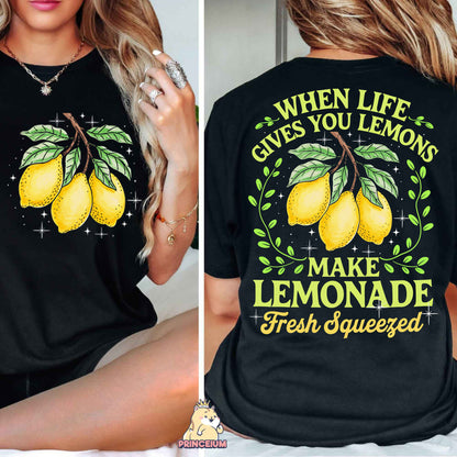 a woman wearing a t - shirt that says when life gives you lemons make