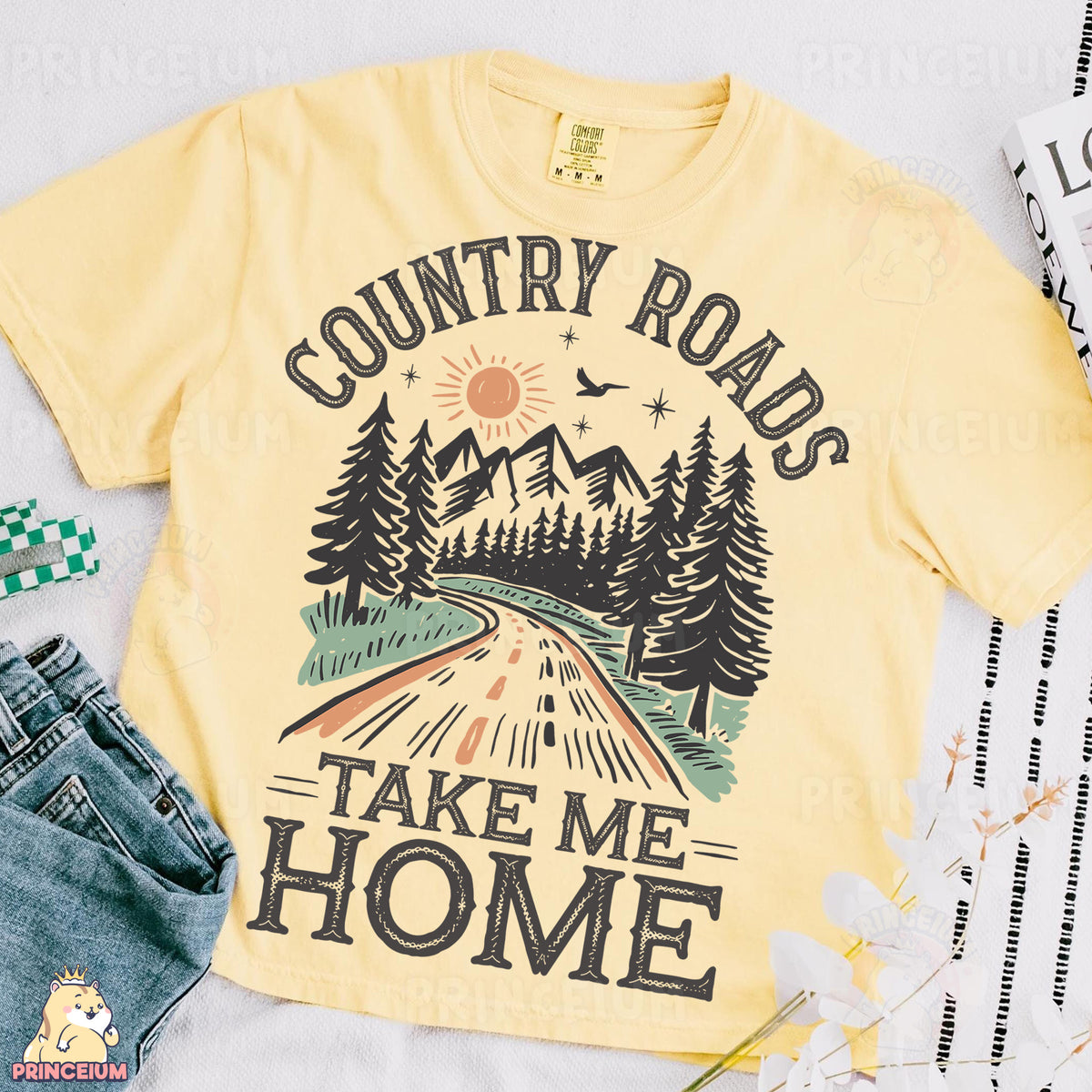 a yellow shirt that says country roads take me home
