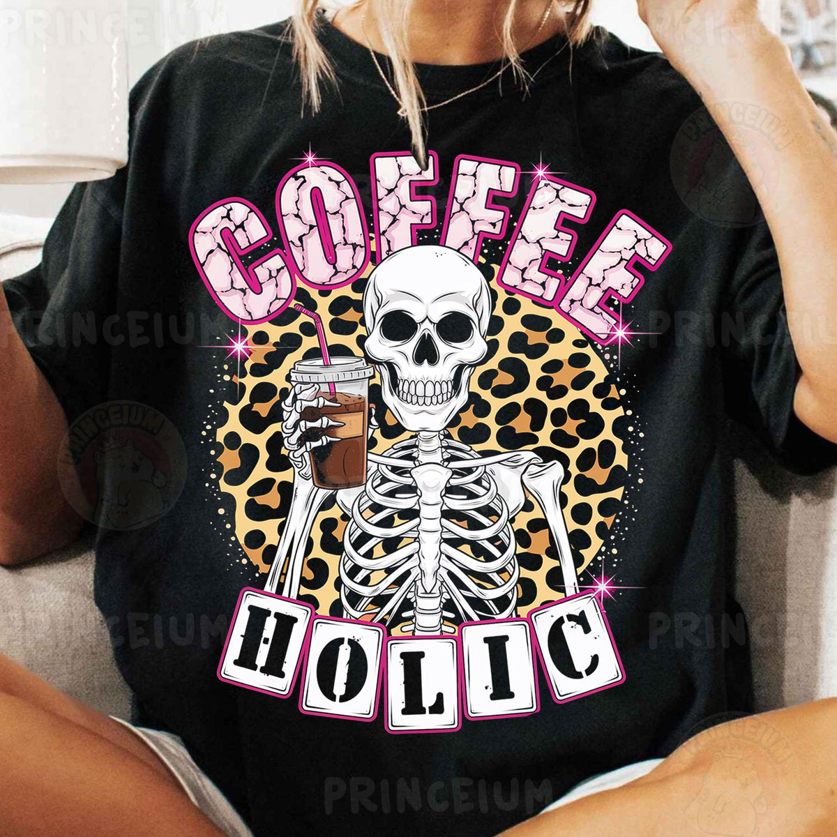 a woman sitting on a couch holding a glass of coffee
