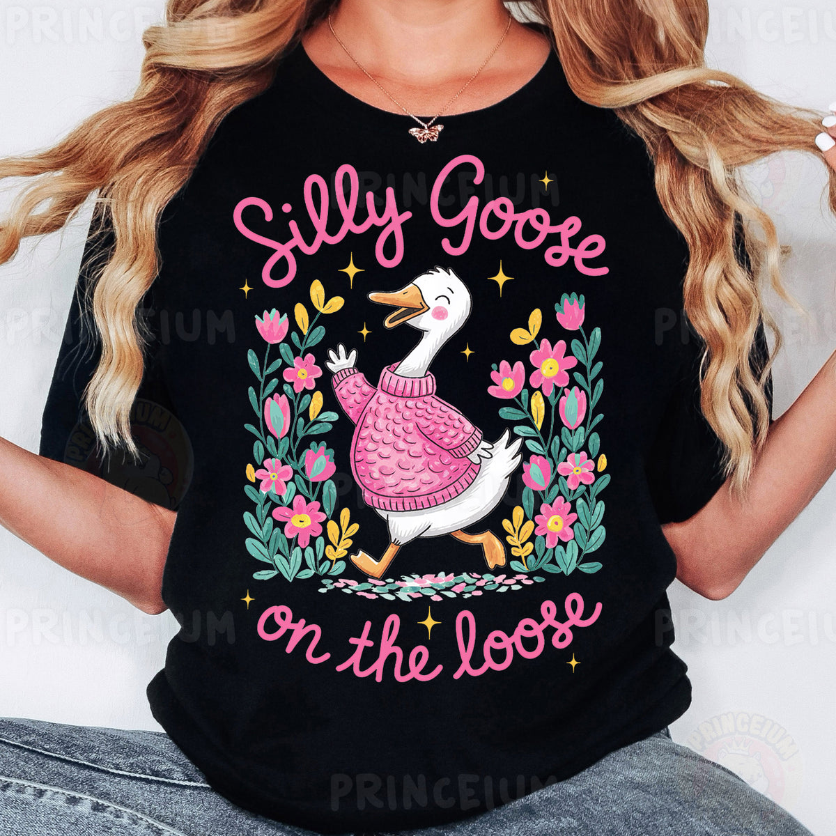 a woman wearing a black shirt that says silly goose on the loose