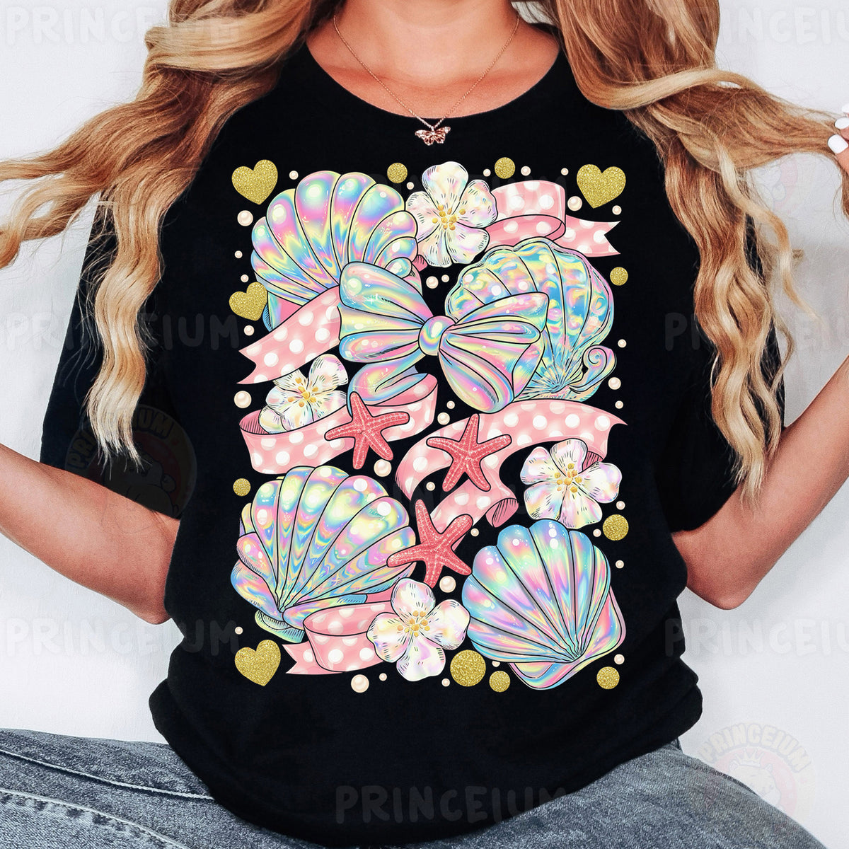 a woman wearing a black t - shirt with colorful seashells on it
