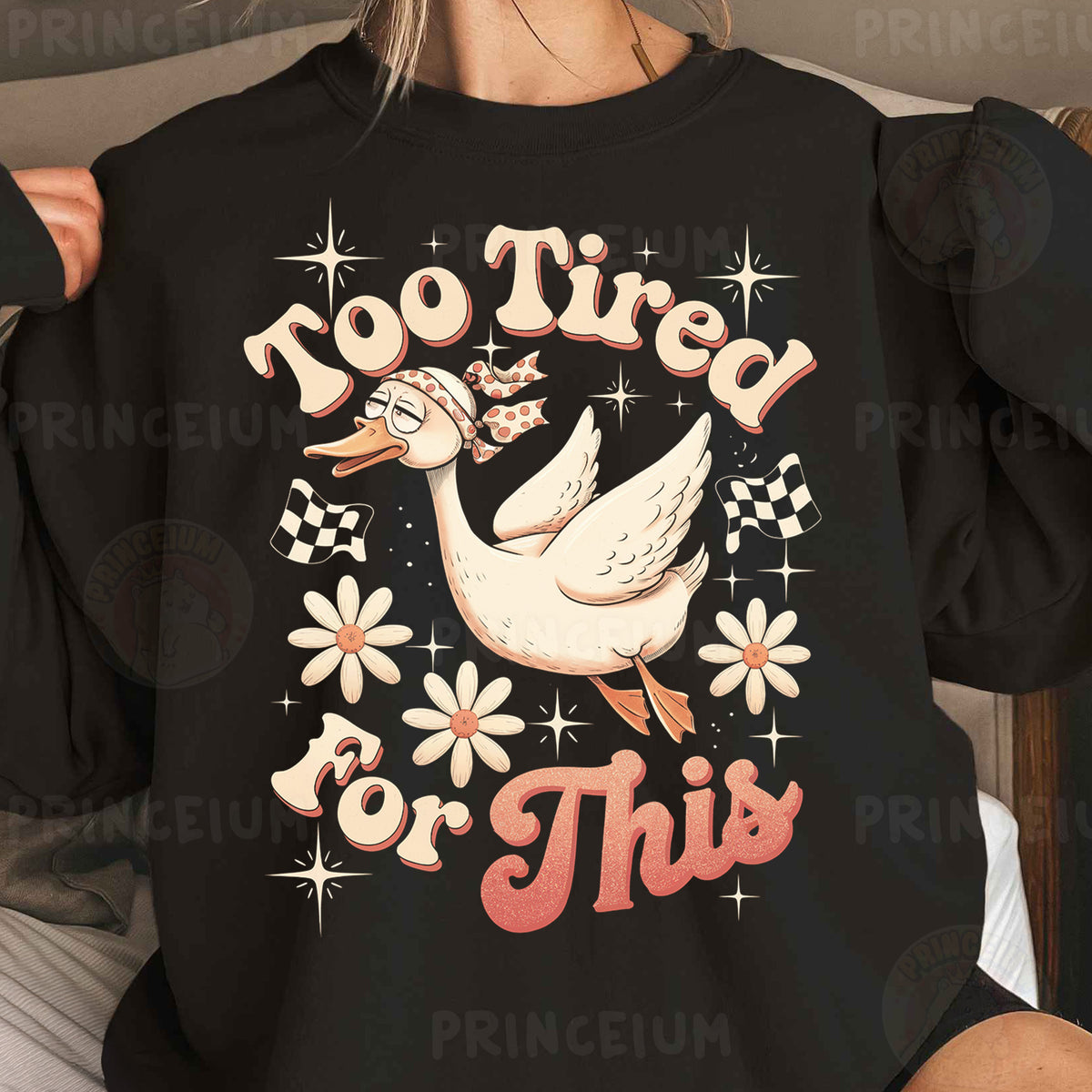 a woman wearing a black shirt that says too tired for this