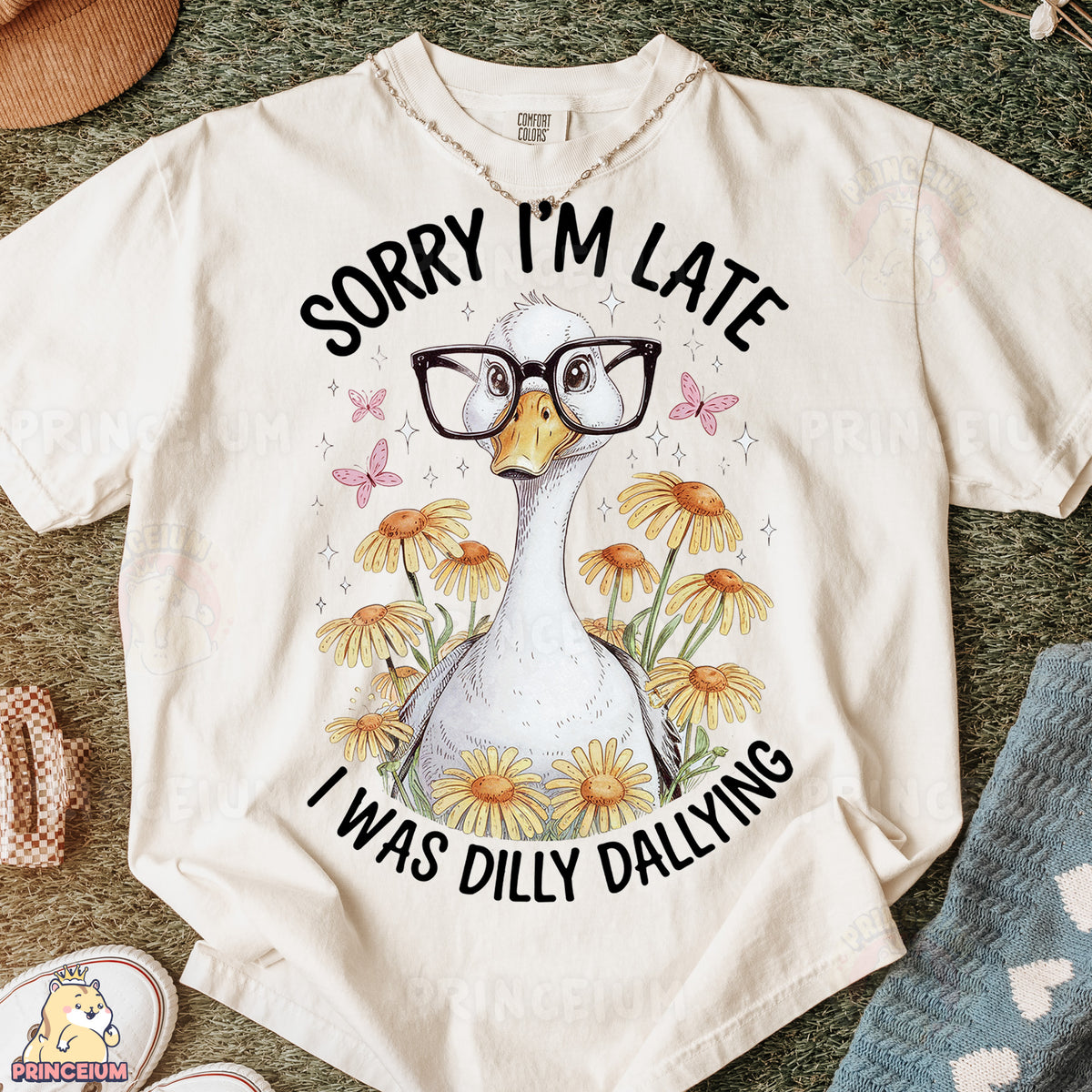 a white shirt with a picture of a duck wearing glasses