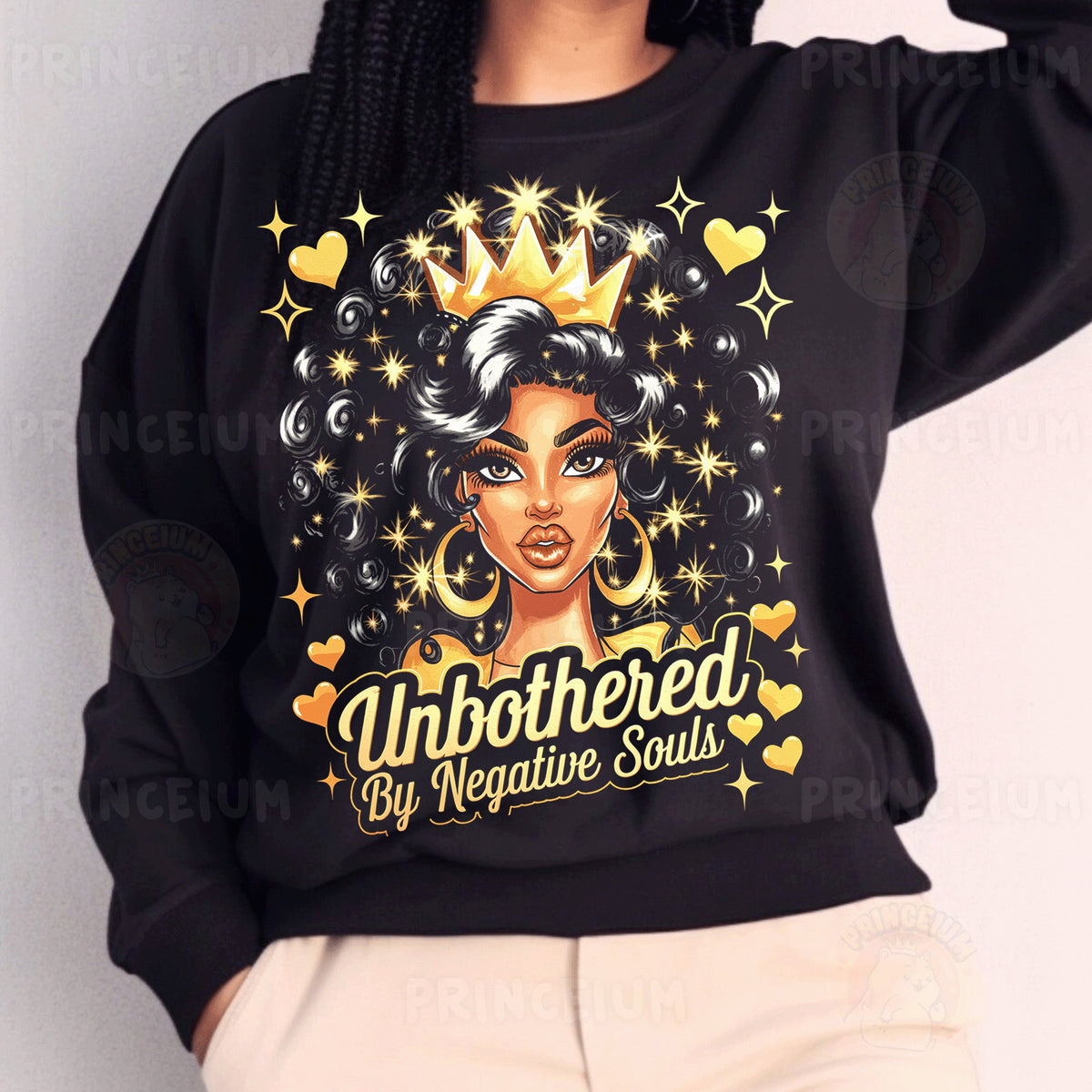 a woman wearing a black sweatshirt with a crown on her head