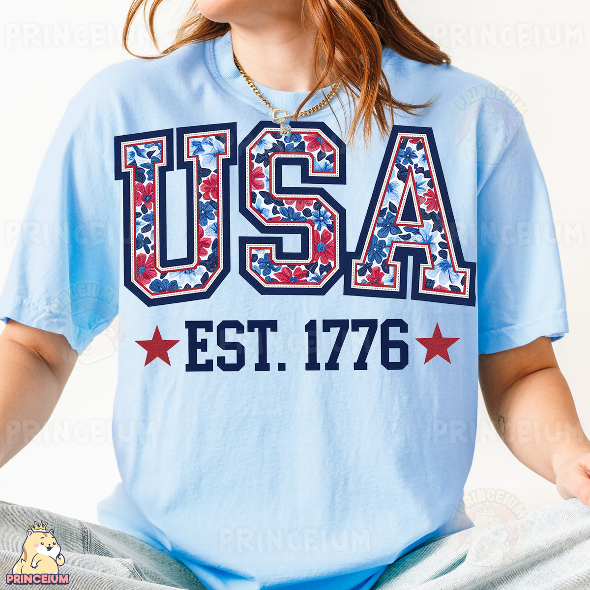 a woman in a usa t - shirt sitting on a bed