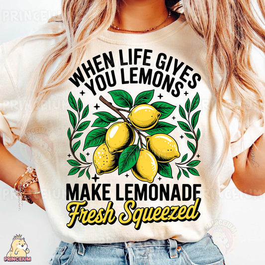 a woman wearing a t - shirt that says when life gives you lemons make