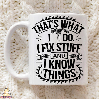 a white coffee mug sitting on top of a white blanket
