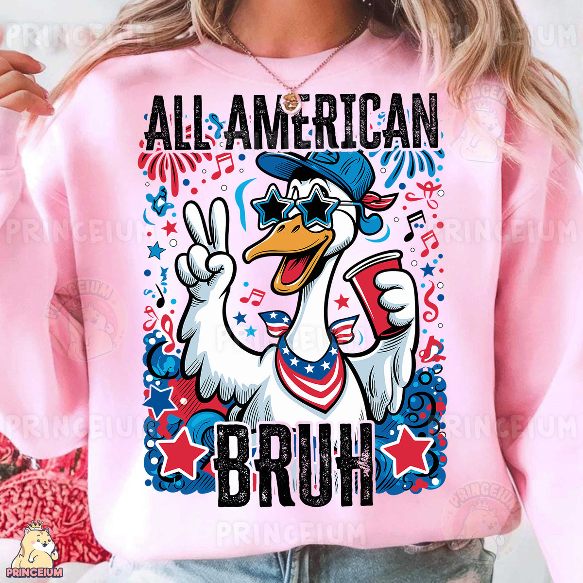 a woman wearing a pink sweatshirt with an image of a duck on it