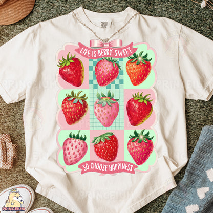 a t - shirt with a bunch of strawberries on it