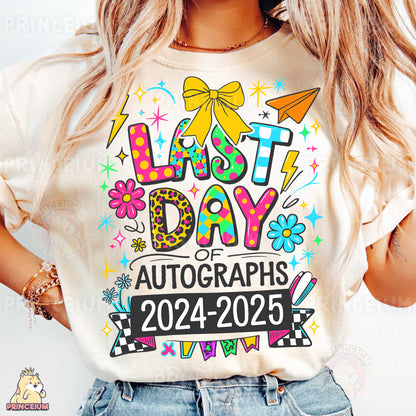 a woman wearing a t - shirt that says last day of autographs