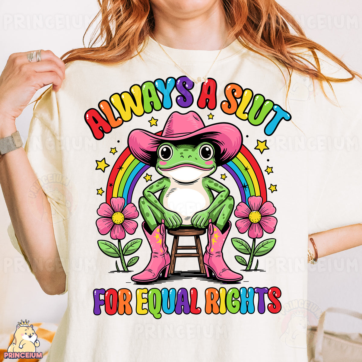 a woman wearing a t - shirt with a frog wearing a cowboy hat