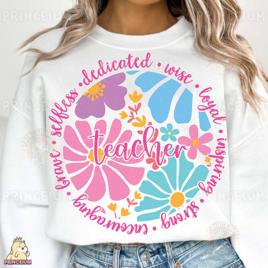 a woman wearing a white sweatshirt with colorful flowers on it