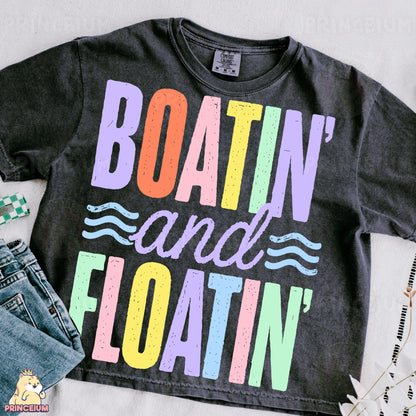 a t - shirt that says boatin and floatin on it