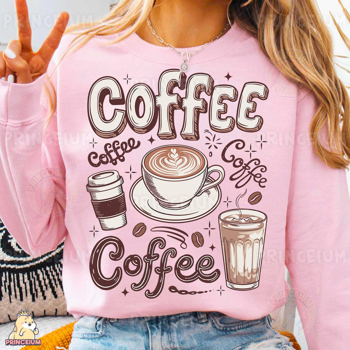 a woman wearing a pink sweatshirt with coffee on it