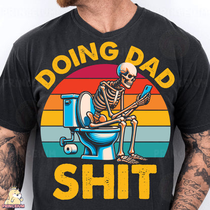 a man wearing a black shirt with a skeleton sitting on a toilet