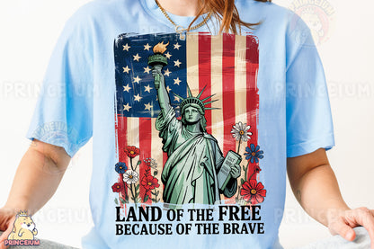 a woman wearing a t - shirt with the statue of liberty on it