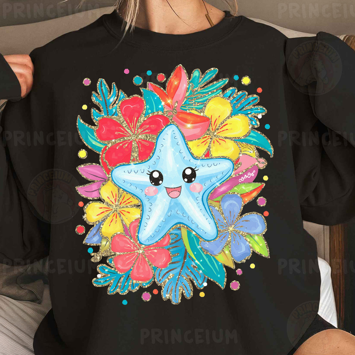 a woman wearing a black shirt with a starfish on it