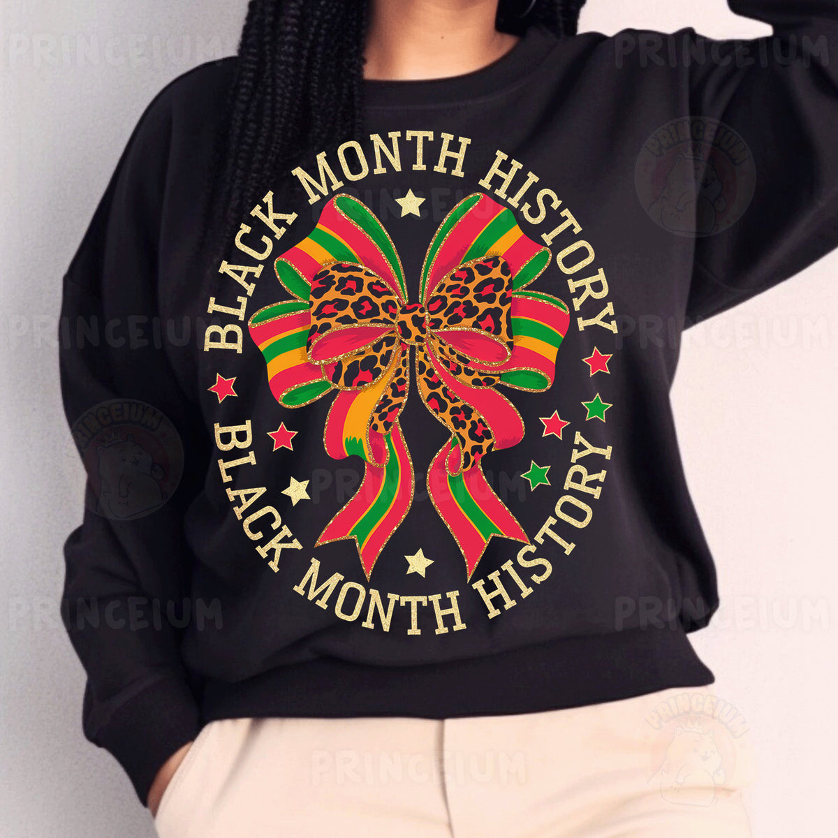 a woman wearing a black sweatshirt with a bow on it