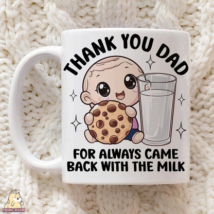 a coffee mug with a picture of a baby holding a cookie