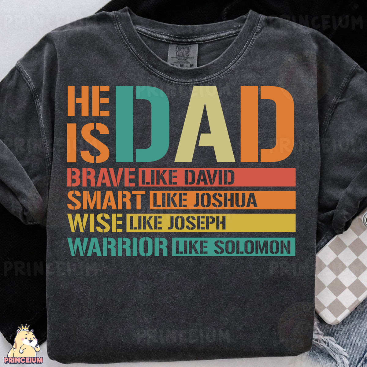 a t - shirt with the words he is dad on it