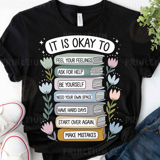 a t - shirt that says it is okay to read books