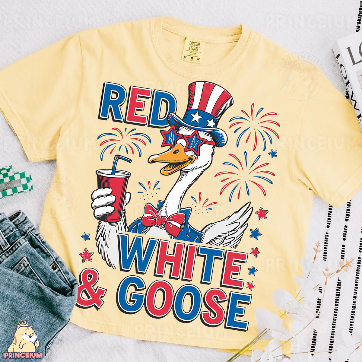 a red, white and goose t - shirt on a table