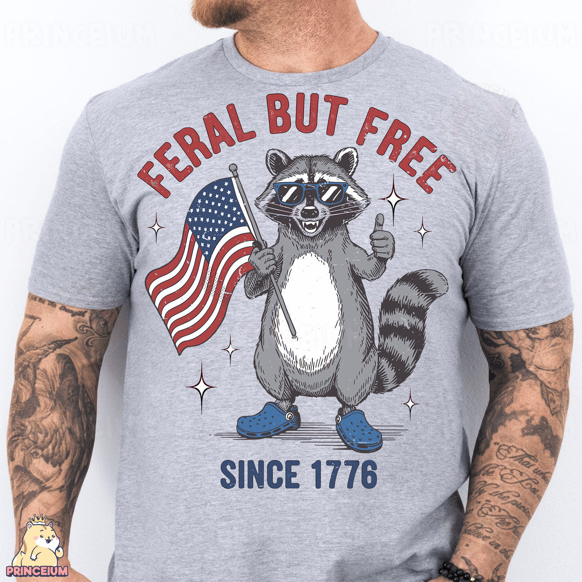 a man wearing a t - shirt with a raccoon holding an american flag