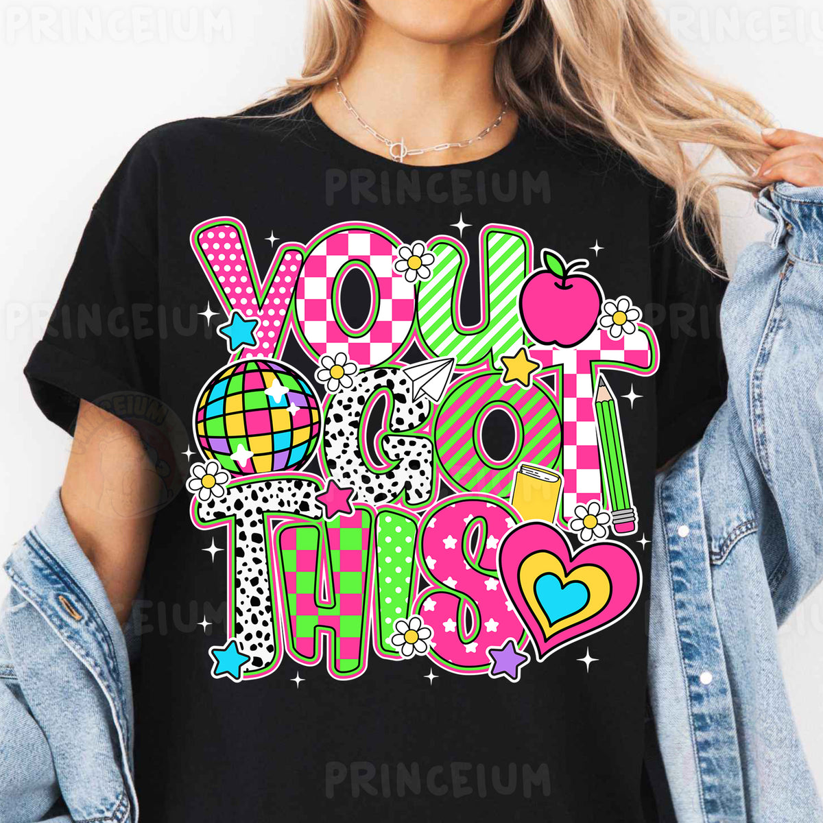 a woman wearing a black t - shirt that says you got this