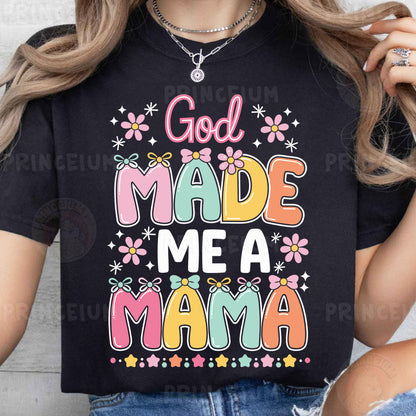 a woman wearing a t - shirt that says god made me a mama