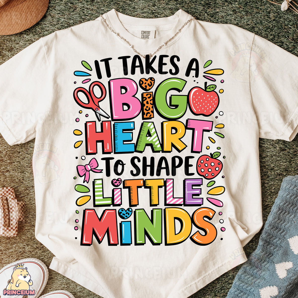 a t - shirt that says it takes a big heart to shape little minds