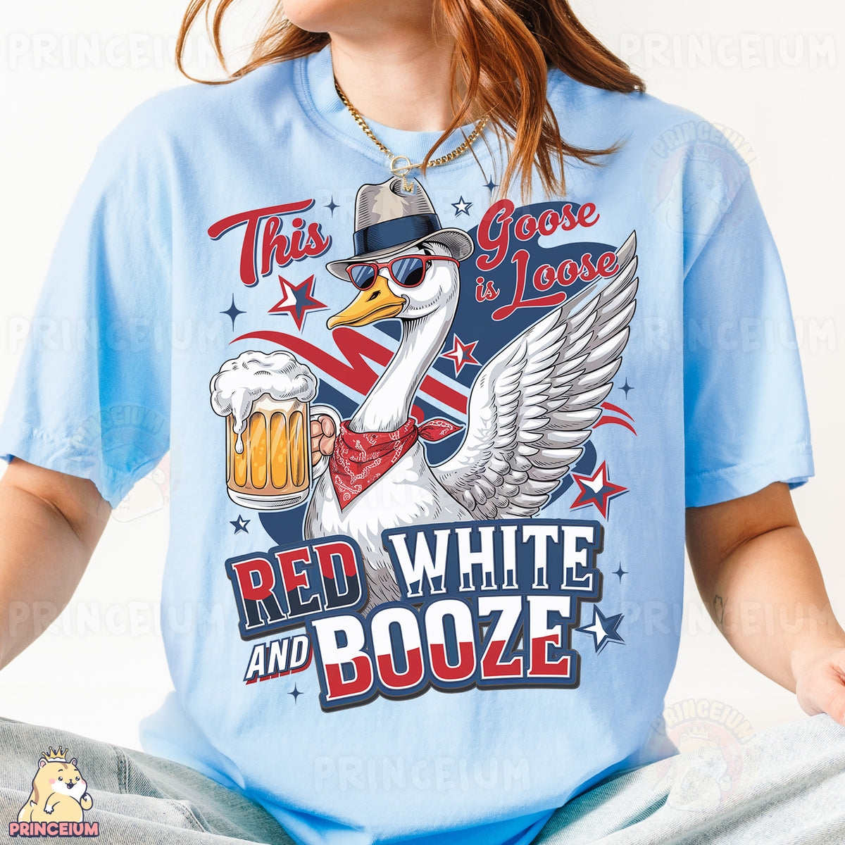 a woman wearing a blue t - shirt with a white goose on it
