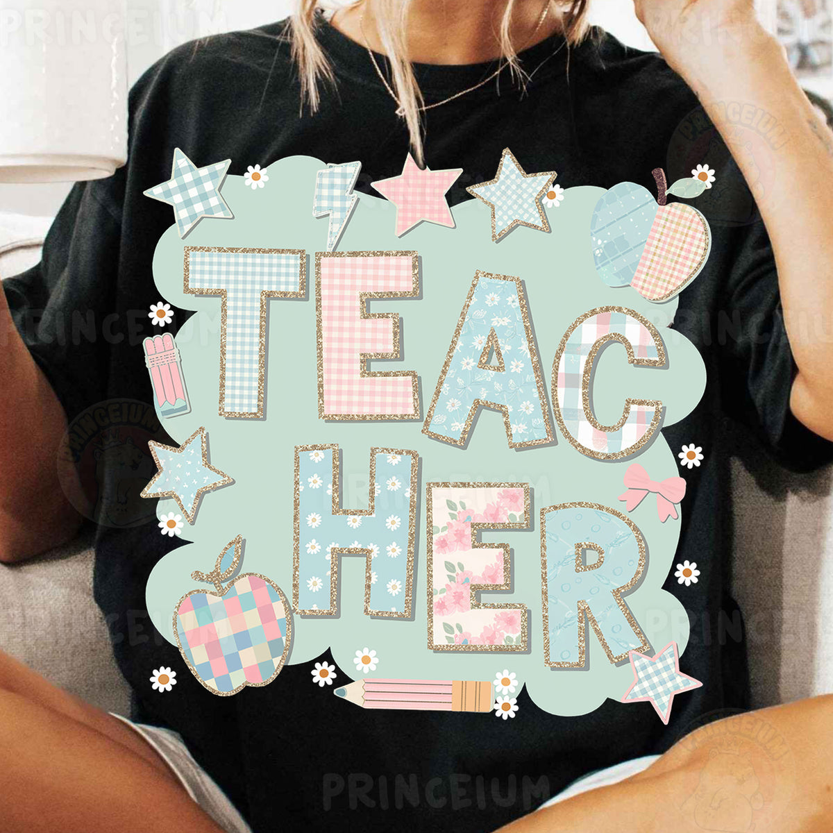 a woman sitting on a couch wearing a t - shirt that says teac her