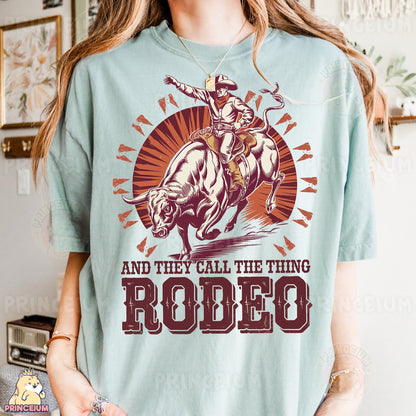 a woman wearing a t - shirt that says rodeo and they call the thing rodeo