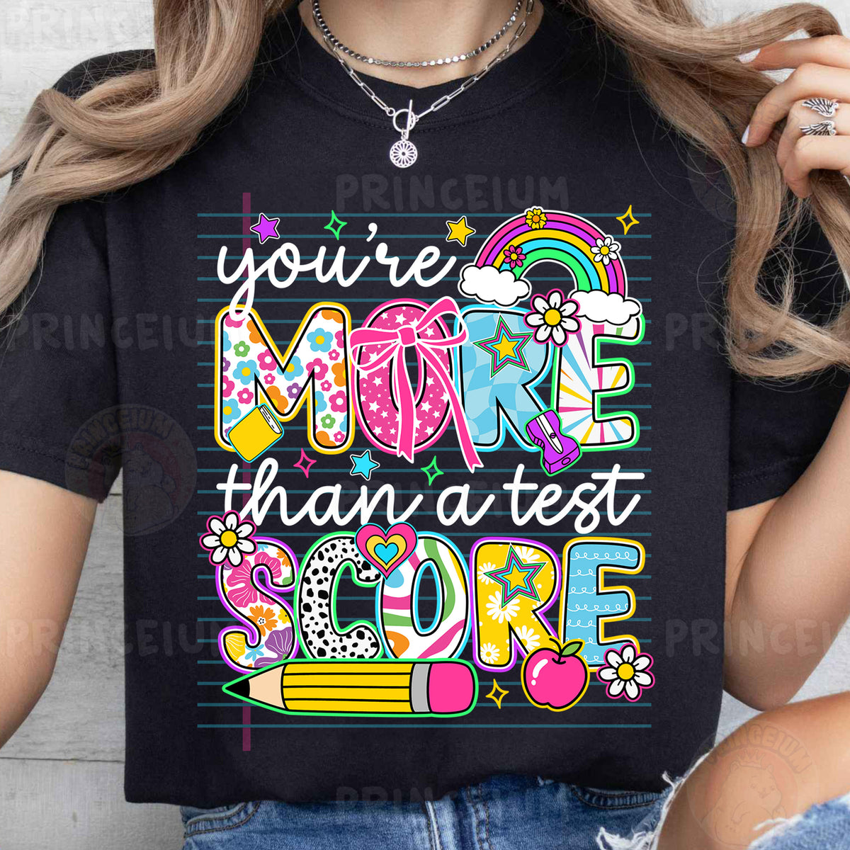 a woman wearing a t - shirt that says you're more than a test