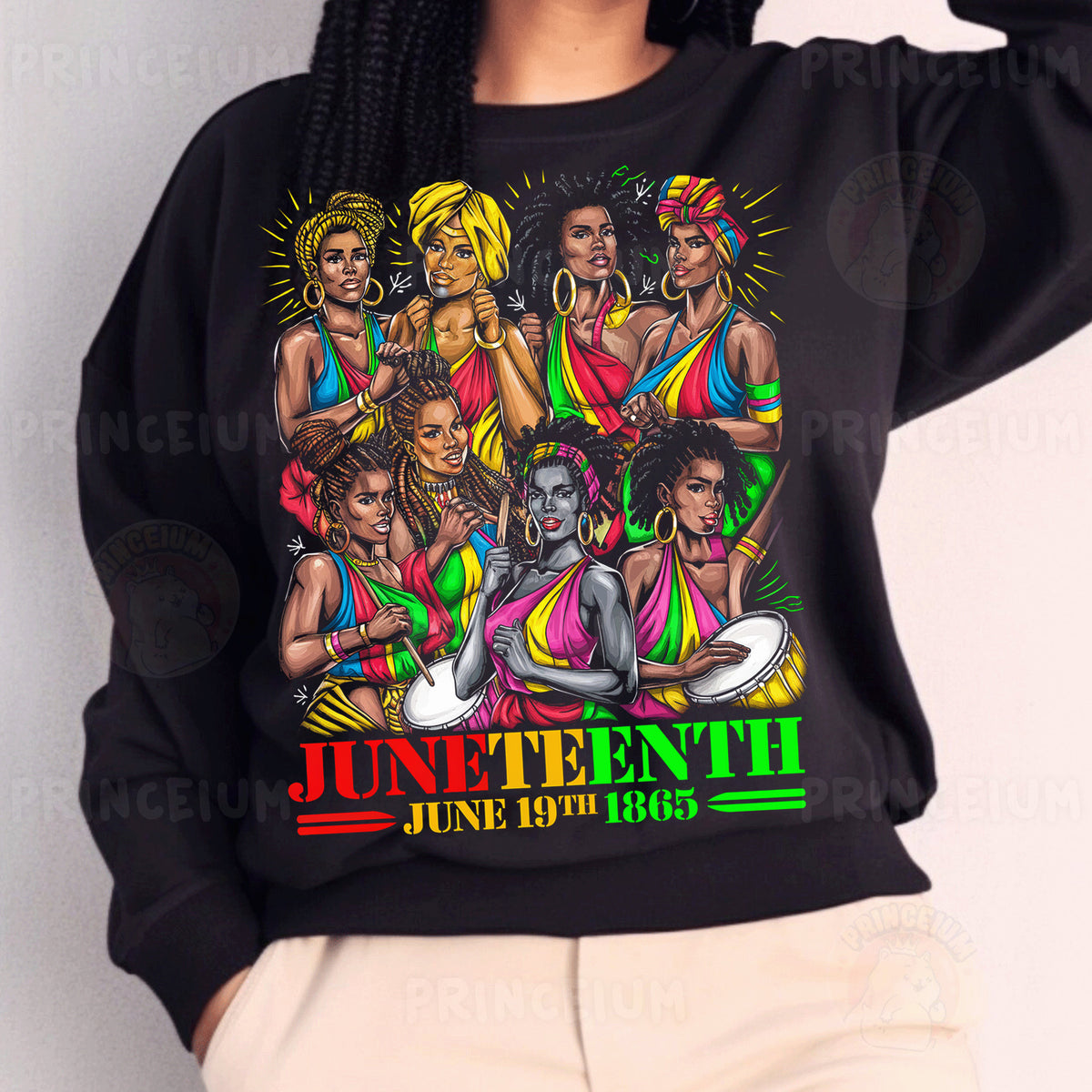 a woman wearing a black sweatshirt with a group of women on it