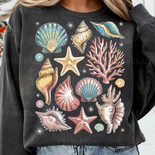 a woman wearing a black sweatshirt with colorful seashells on it