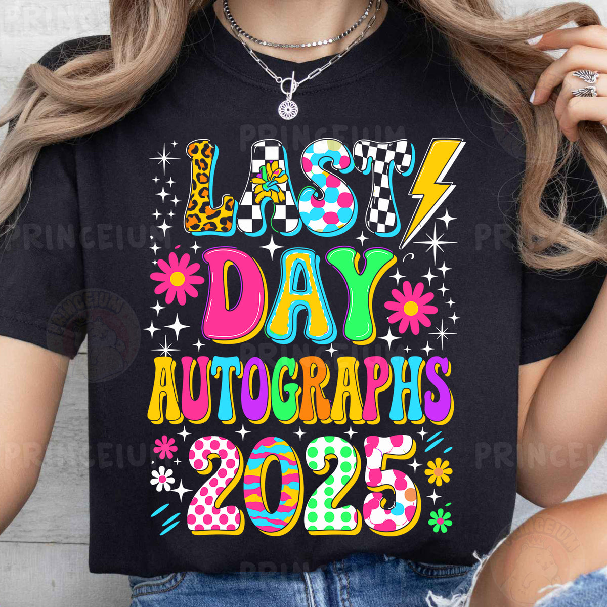 a woman wearing a black t - shirt with the words last day autographs 205